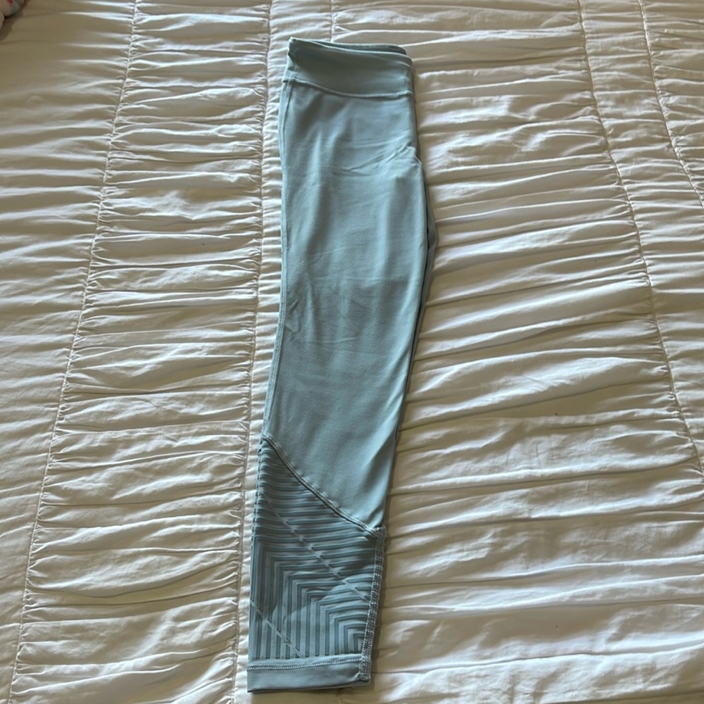 Athleta girl light blue, high rise flocked chit chat tight leggings. Size L(12)